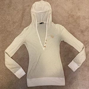 Guess women’s cream hooded sweater with gold accents